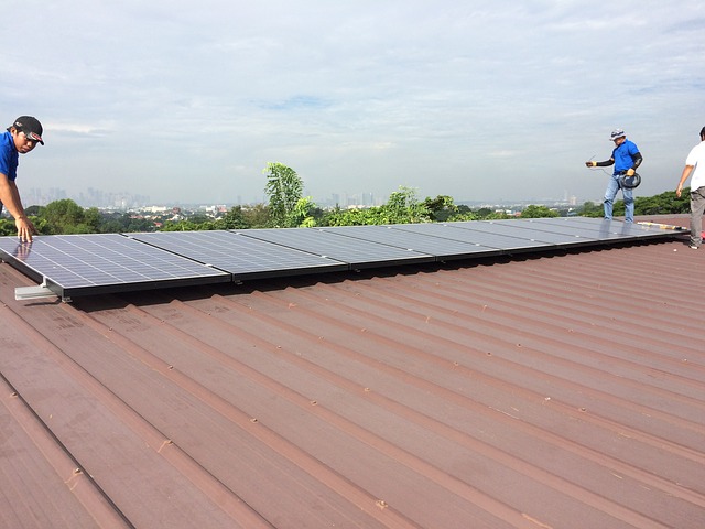 men installing solar panels